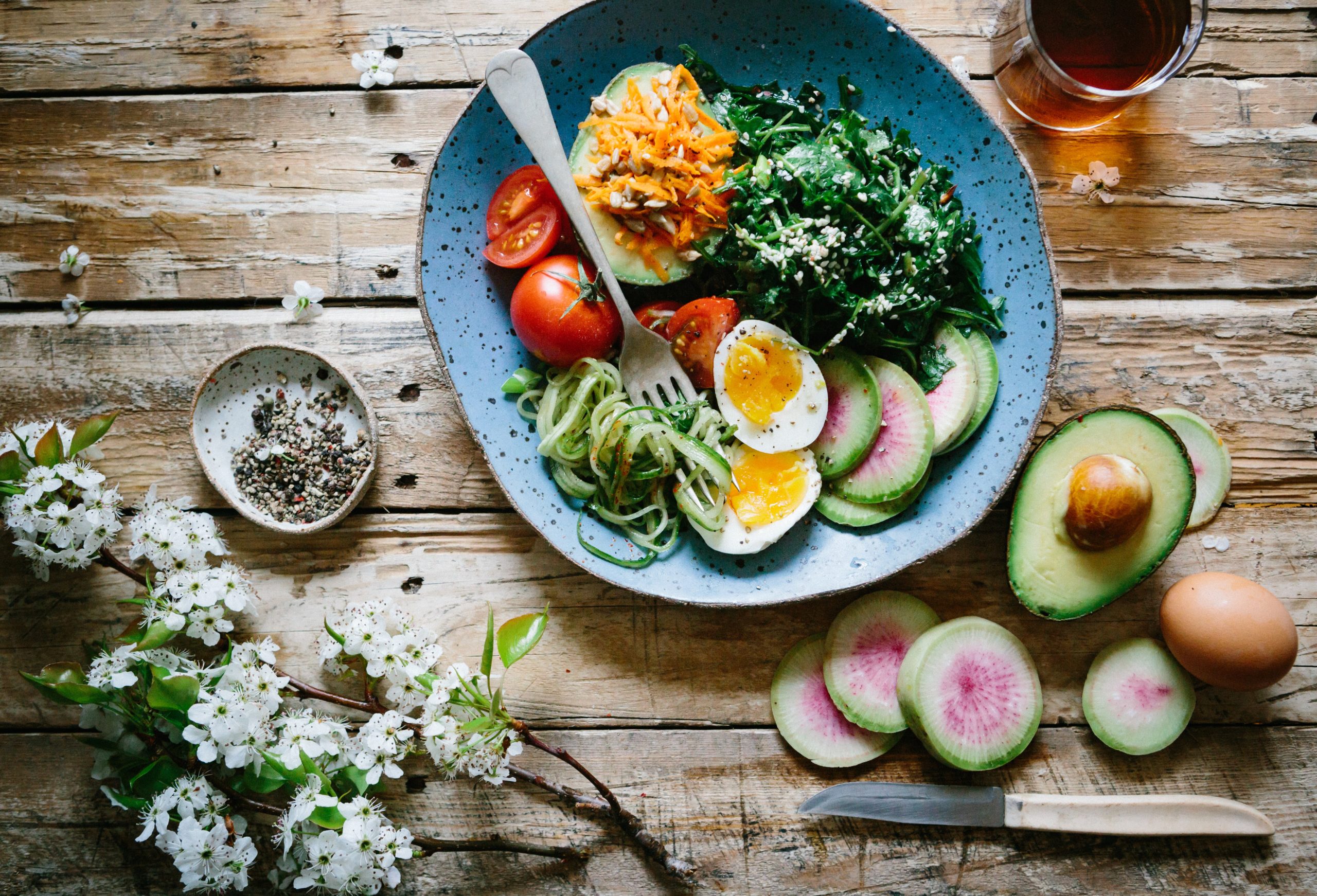 healthy salad on wooden table