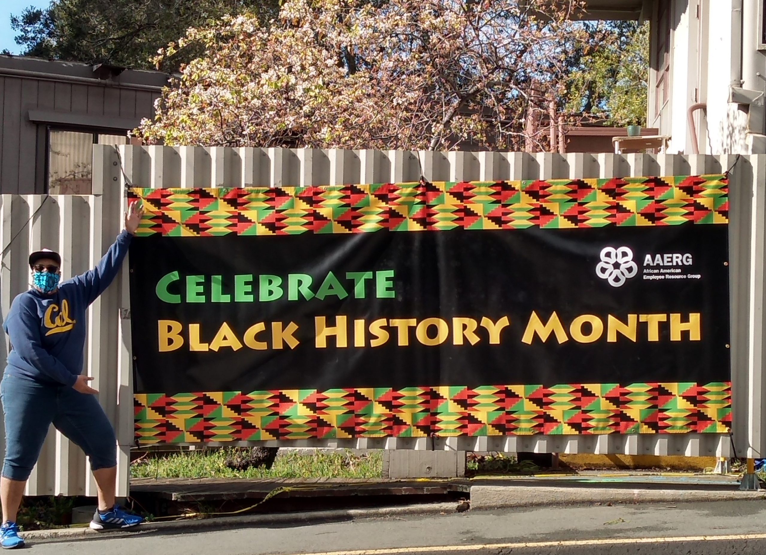 Black history month banner on fence