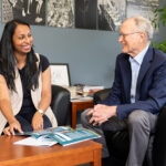 Aditi Chakravarty, left, discussing the IDEA progress report with Lab Director Mike Witherell